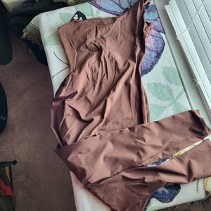 Skims one shoulder onesie